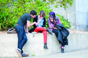 Three students working together image